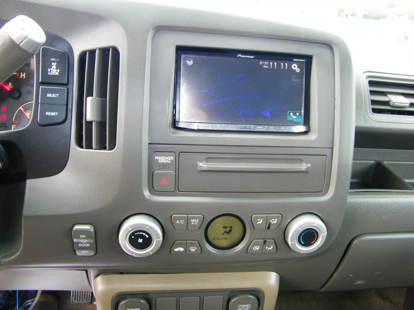 2007 Maroon /Grey Honda Ridgeline RT (2HJYK16267H) with an 3.5L V6 SOHC 24V engine, 5-Speed Automatic Overdrive transmission, located at 4000 Bee Ridge Road, Sarasota, FL, 34233, (941) 926-0300, 27.298664, -82.489151 - Photo#20